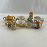Occupied Japan Tea Set, Vase, and Figurines