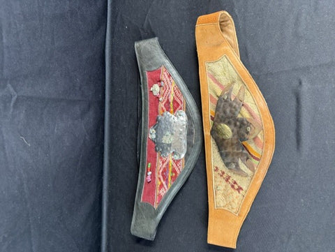 Two beautiful leather belts with handcrafted wool and metal designs