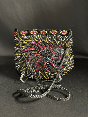 Multi color evening bag..black background